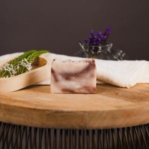 Nourish Vanilla Cream on wooden board with decorative elements