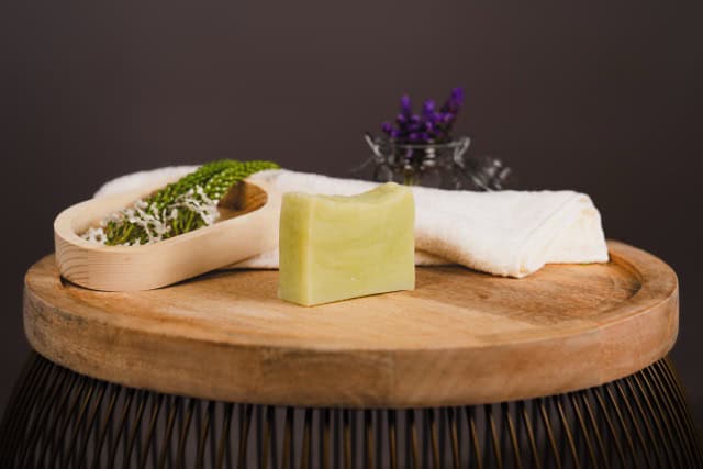 Nourish Fresh Soap angled on a wooden board